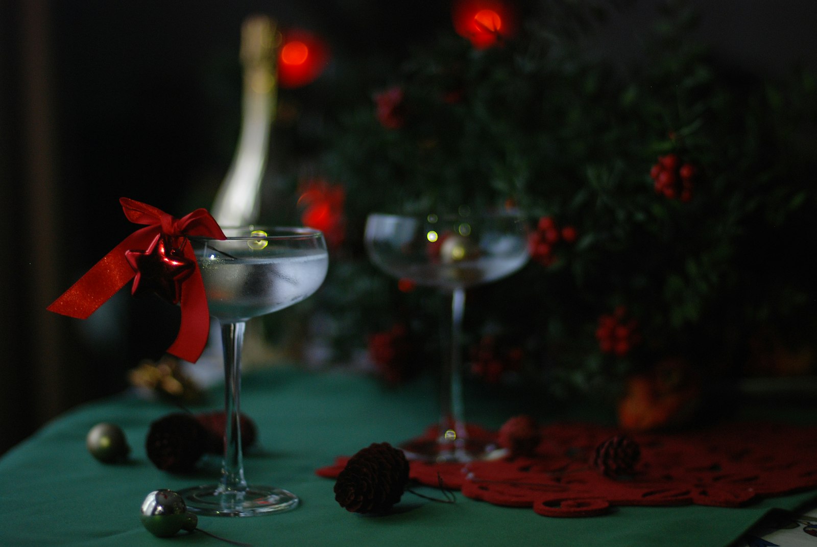 A festive table with a large pot of mulled wine and glasses ready for a party