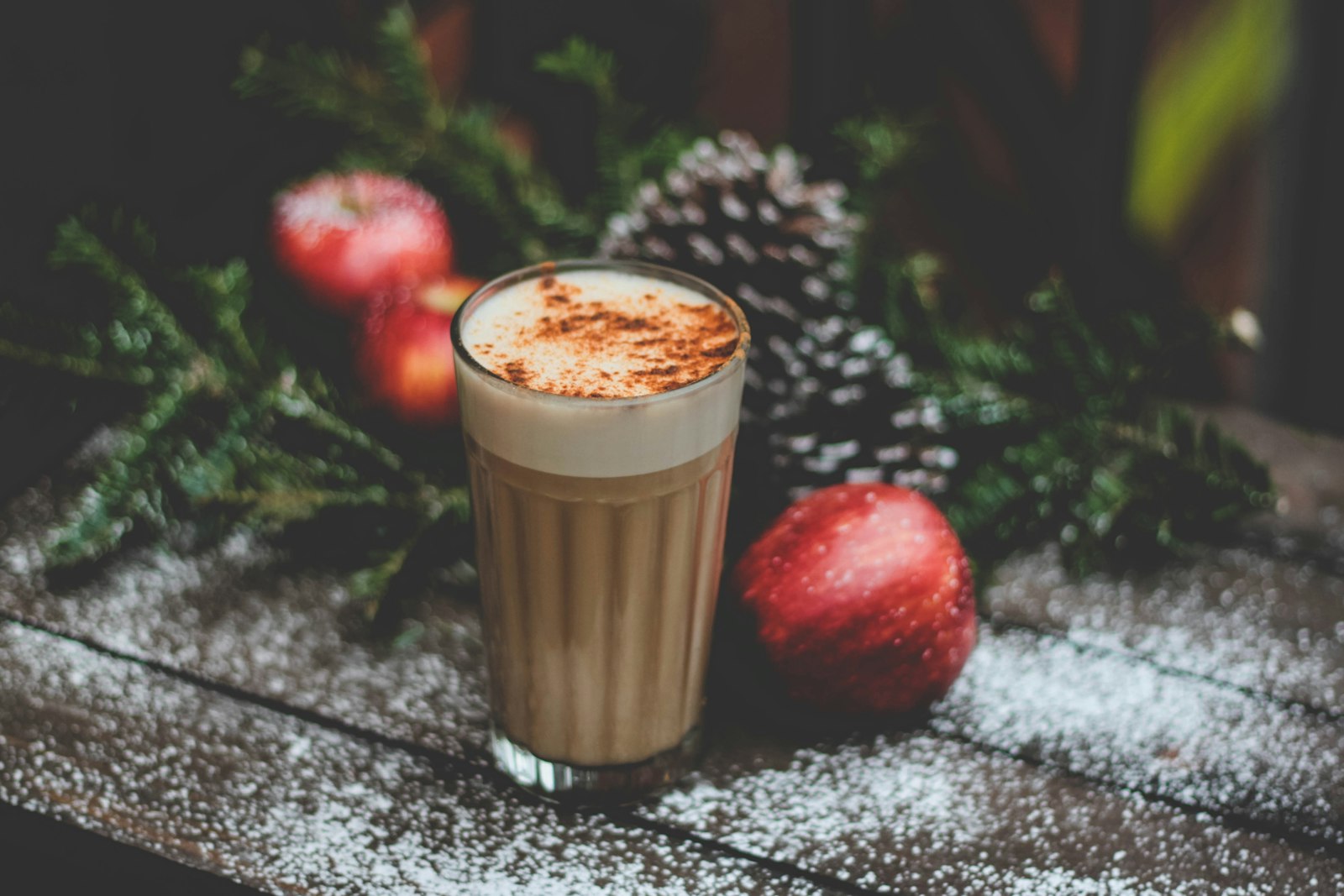 Alcohol-free mulled cider in a heatproof mug with orange slices, cinnamon sticks and star anise